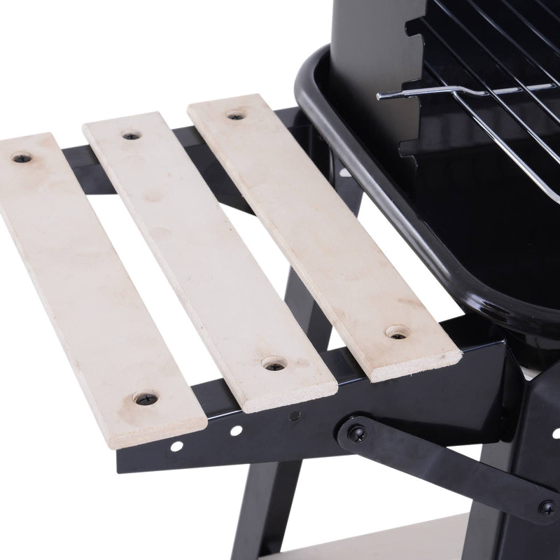 Charcoal grill with wooden table