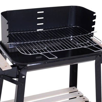 Charcoal grill with wooden table